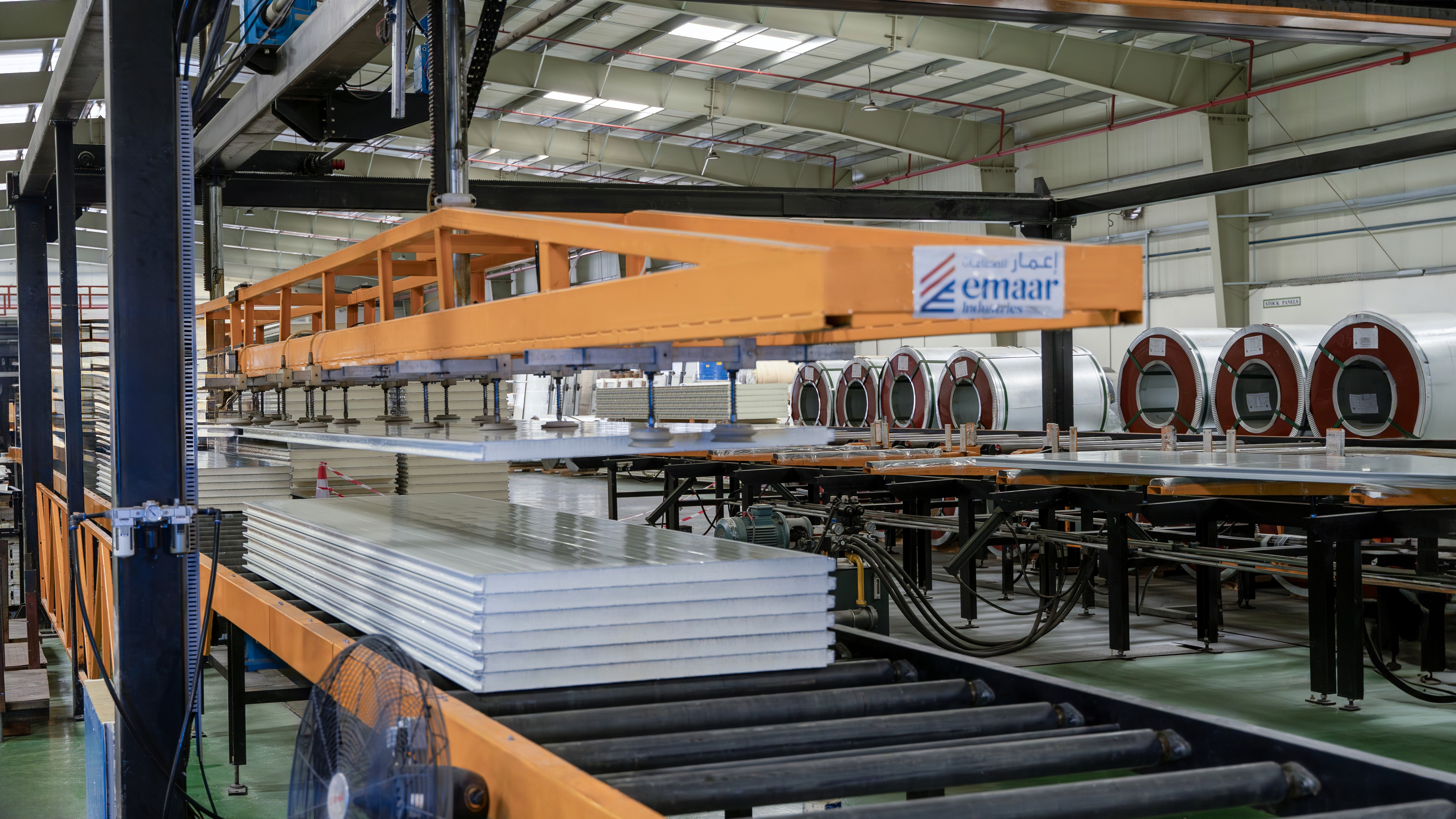 Continuous lamination and sandwich panel fabrication lines